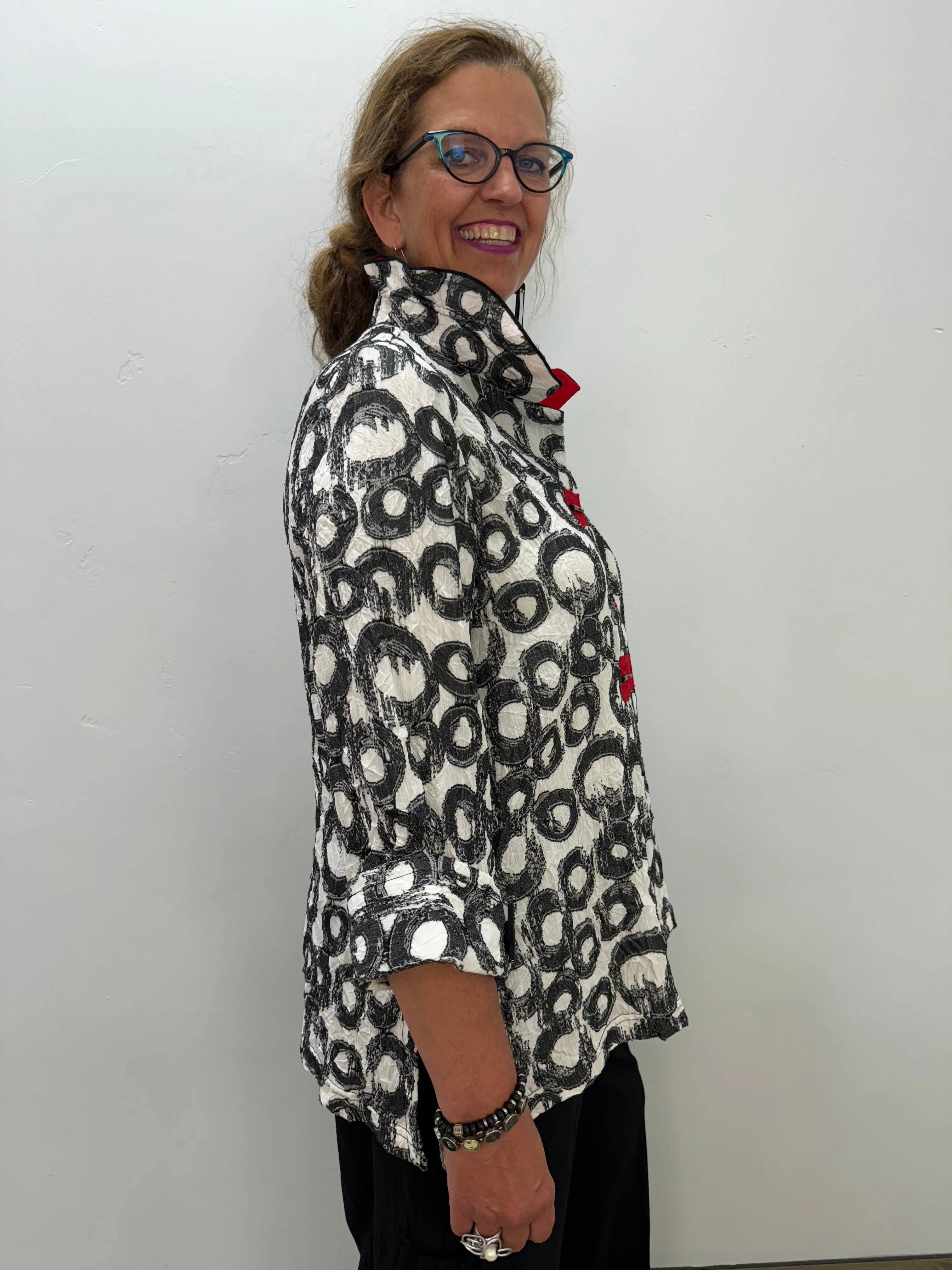 Black and White Pattern Jacket with Red Accent